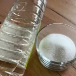 Combine vinegar with salt and solve one problem. The glow will immediately blind your guests